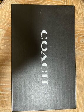 Coach Black Box with White Coach Carriage Logo